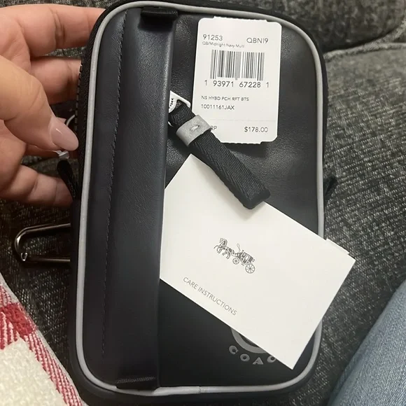 Coach north/south leather pouch